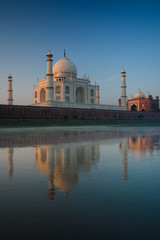 Fototapeta na wymiar Jamuna River Reflection of Rear of Taj Mahal at Sunrise