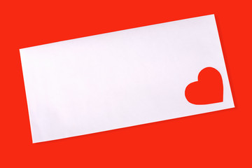 Envelop with red heart on red background