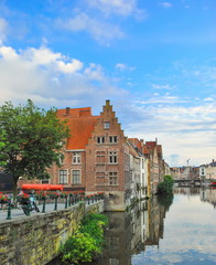 Fototapeta na wymiar The embankment of Belgian city of Ghent with ancient stone houses