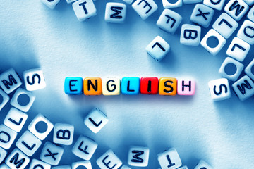 colorful english word cube on white paper background ,English language learning concept