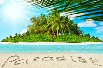 Obraz premium Whole tropical island within atoll in tropical Ocean and inscription 