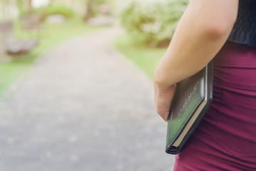 Business woman holding a notebook Field work,Business working a outdoor