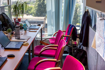 Office. Comfortable work table, workplace with notebook laptop
