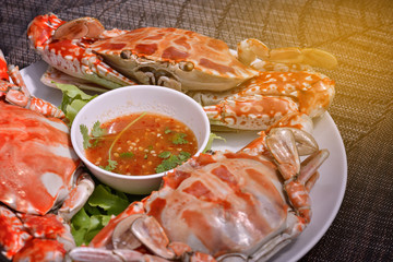 Steamed Crab with Thai spicy seafood sauce , light effect. 
