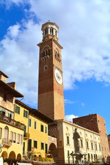 Fototapeta premium The old medieval tower with the blue sky in Verona called 