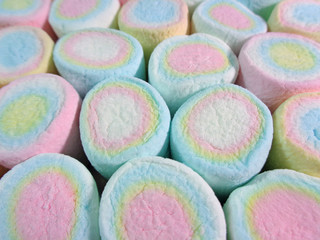 Closed up the Texture of Lined up Pastel Pink, Yellow, Blue Colored Marshmallows, for Background, Banner, Pattern