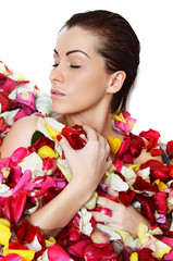 Fototapeta premium Beautiful female in bath with rose petal. Body care.