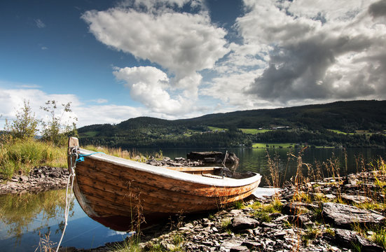 Small fishing boat in Norwegian fjord