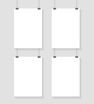 Vector template of 4 poster on clips . Vertical blank A4 mockup banner