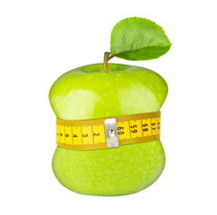 green apple diet concept with measuring tape fruit isolated on white background / frischer apfel grün mit maßband abnehmen konzept isoliert hintergrund weiß