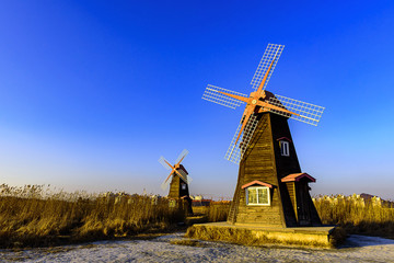 Traditional Dutch old wooden windmill in Zaanse Schans - museum village in Zaandam. The Netherlands in Korea