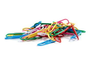 Bunch of colorful paper clips on white backgrpund