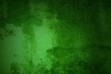 Grüner verschmutzter Hintergrund mit Schrammen