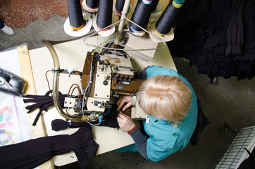 Machinery and equipment in a spinning production company interior design. Textile fabric