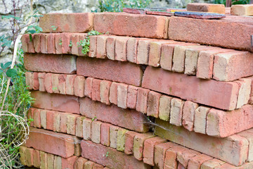  Stack of reclaimed bricks ready to be sold as second hand