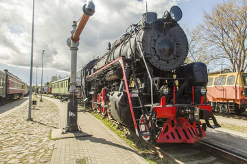 Fototapeta premium Steam locomotive. It was one of the many fast trains of the time