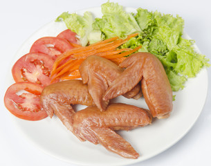 whole grilled chicken served with vegetable