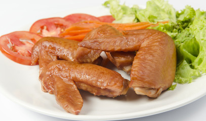 whole grilled chicken served with vegetable