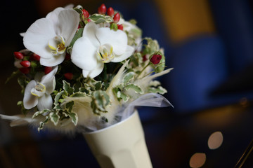 Large white orchids with garden accents wedding bouquet