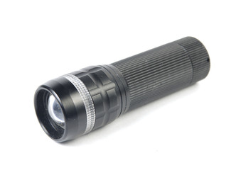 LED flashlight switched on, isolated on white