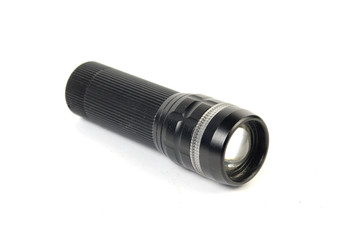 LED flashlight switched on, isolated on white