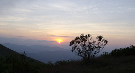 Fototapeta na wymiar silhouette of the mountains at sunset