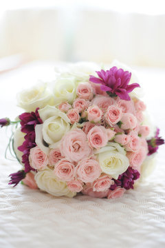 Romantic bridal bouquet with pink and white roses
