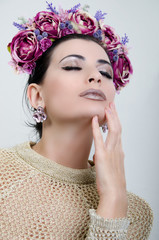 Girl with a chaplet on a head