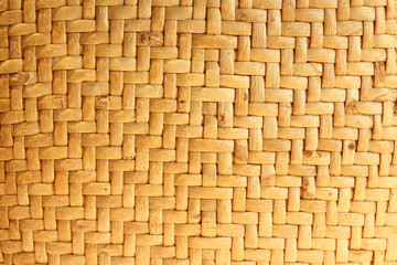 Wicker woven beige mat handmade background.