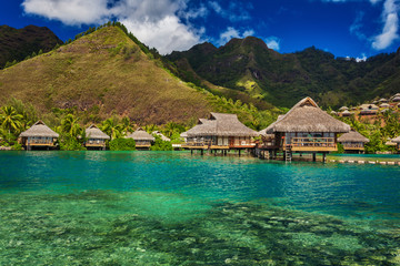 Tropical resort with over water bungalows on Moorea Island