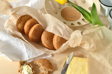 Spring breakfast of home baked buns and butter