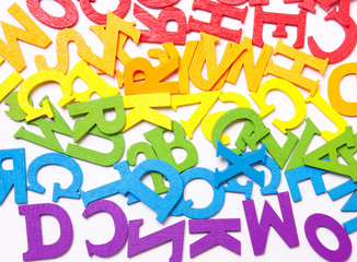 Letters of rainbow colors on a white background