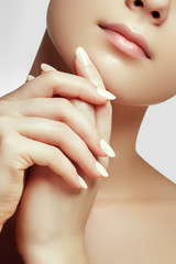 Beautiful woman face close up studio on white