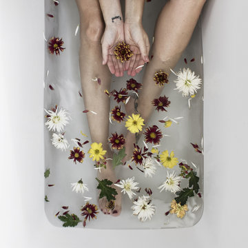 Woman In Bath With Flowers