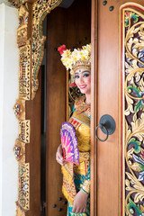 balinese legong dancer at the door