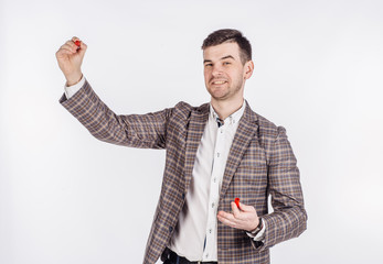 man writing something on glass board with marker