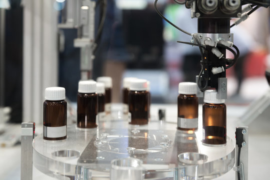 Automatic robot arm with imaging sensor in assembly line working in factory. Smart factory industry 4.0 concept.