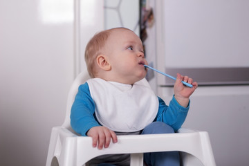 Cute little toddler with spoon