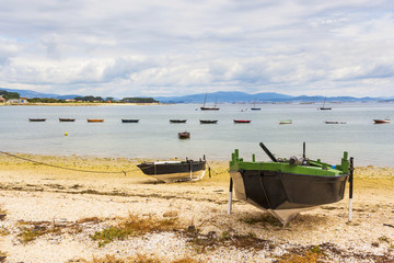 Naklejka na ściany i meble Dorna boats on Vao beach
