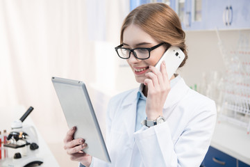 Scientist talking on smartphone