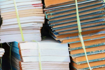 Blurred focus with  Stack of Used Old Books in the School Library