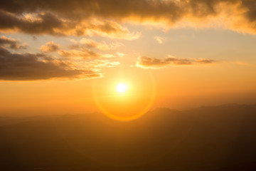 Sunset at the Mountain Hill,Beautiful sunlight, Golden lights background
