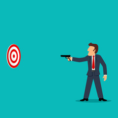 businessman holding a gun aiming a target symbol