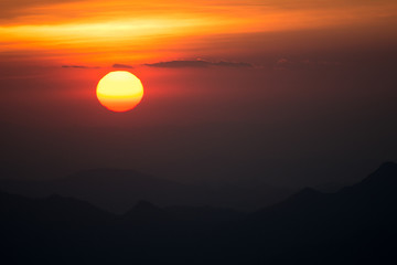 Sunset at the Mountain Hill,Beautiful sunlight, Golden lights background