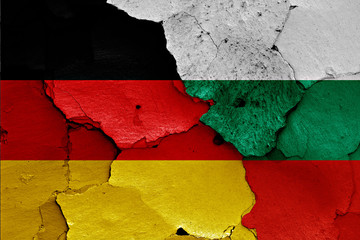 flags of Germany and Bulgaria  painted on cracked wall