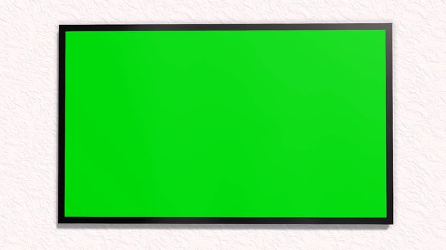  TV with green screen is switched on with remote control 