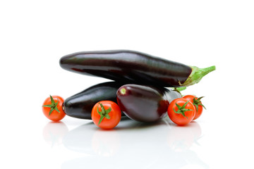 tomatoes and eggplant on a white background