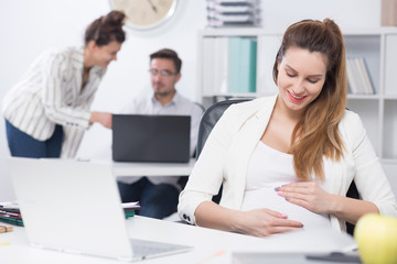 Pregnant woman at work