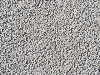 white painted wall with structural plaster