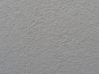 white painted wall with structural plaster